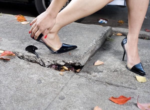 woman with a broken heel