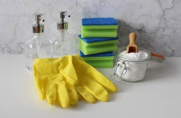 cleaning supplies on a bathroom counter
