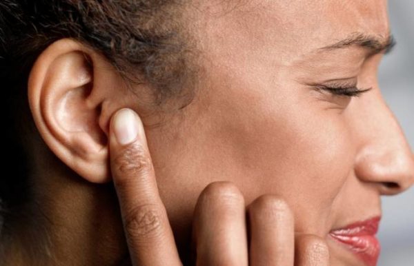 woman with ear pain