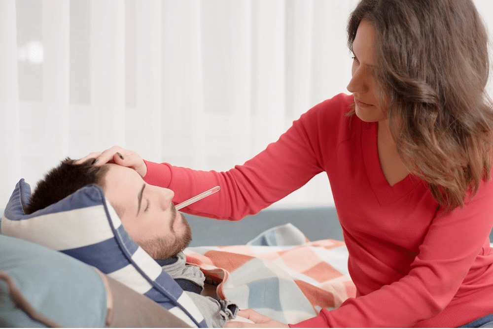 woman caring for her sick husband