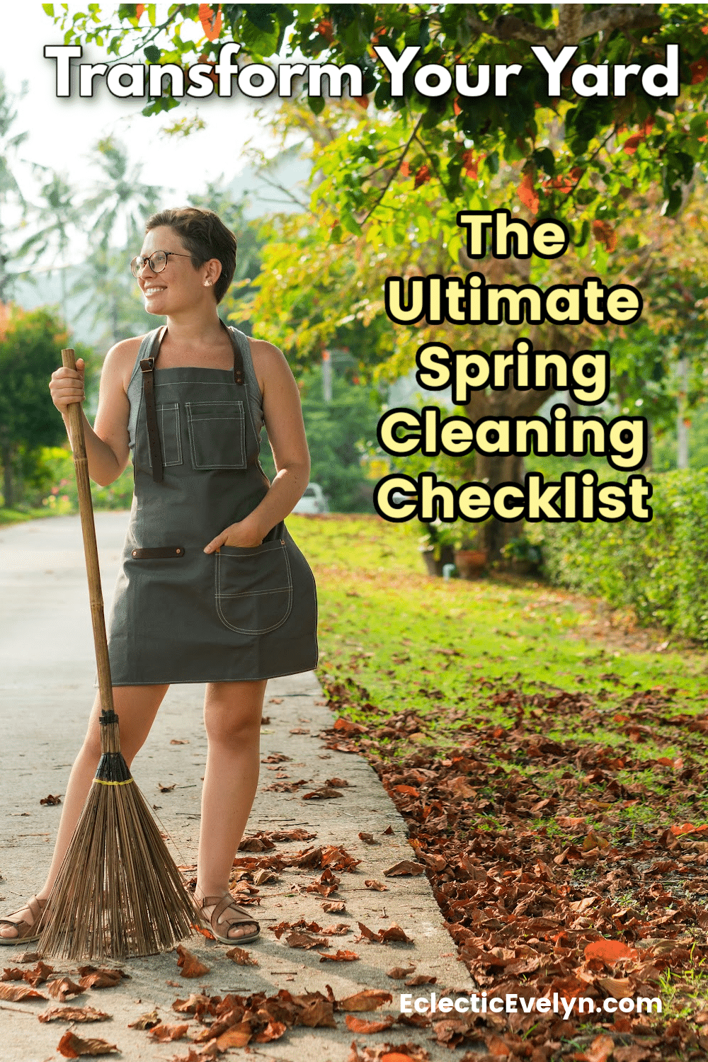 woman with a rake doing a spring clean on her yard