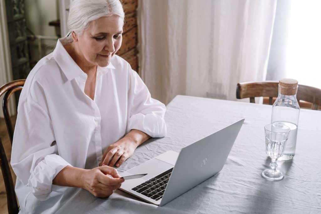 woman over 50 on a laptop
