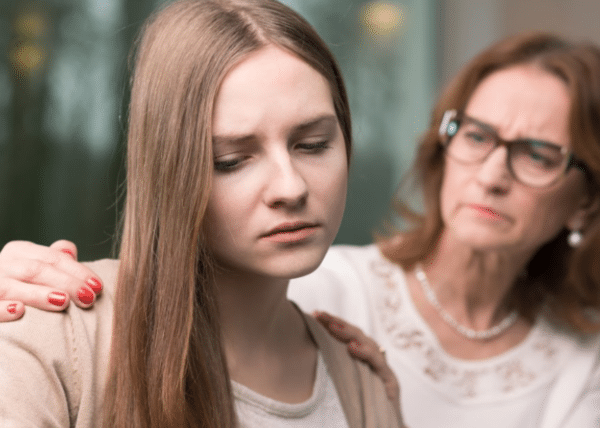 a mother showing concern for her daughter