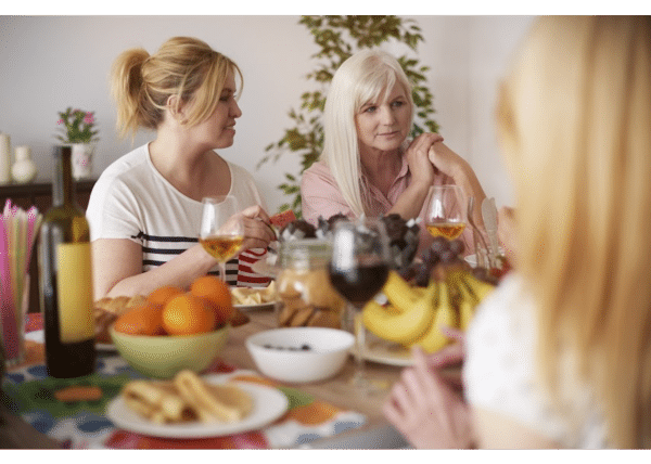 women having dinner with friends