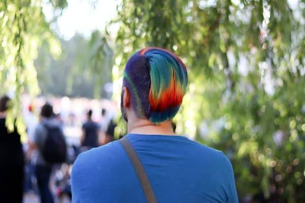a mand with rainbow hair