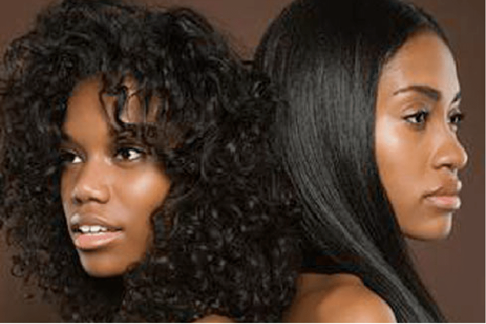 two women one with natural hair and one with a relaxer