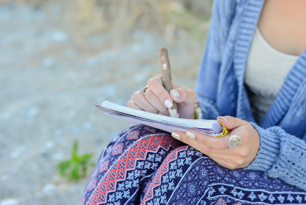 woman over 40 journaling about anxiety