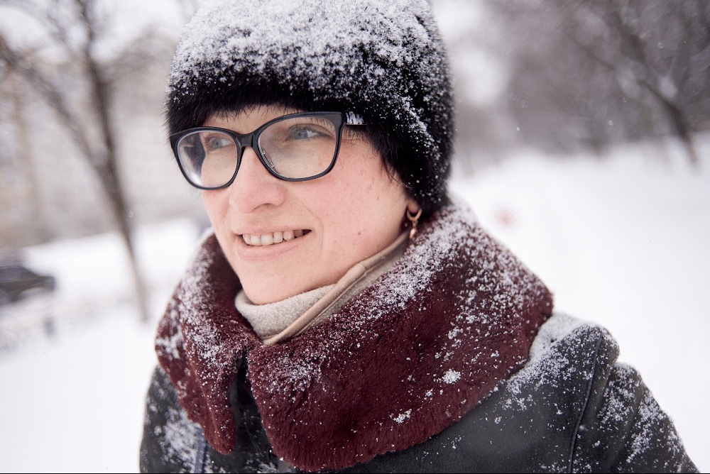 Gen x woman outside in the snow early morning